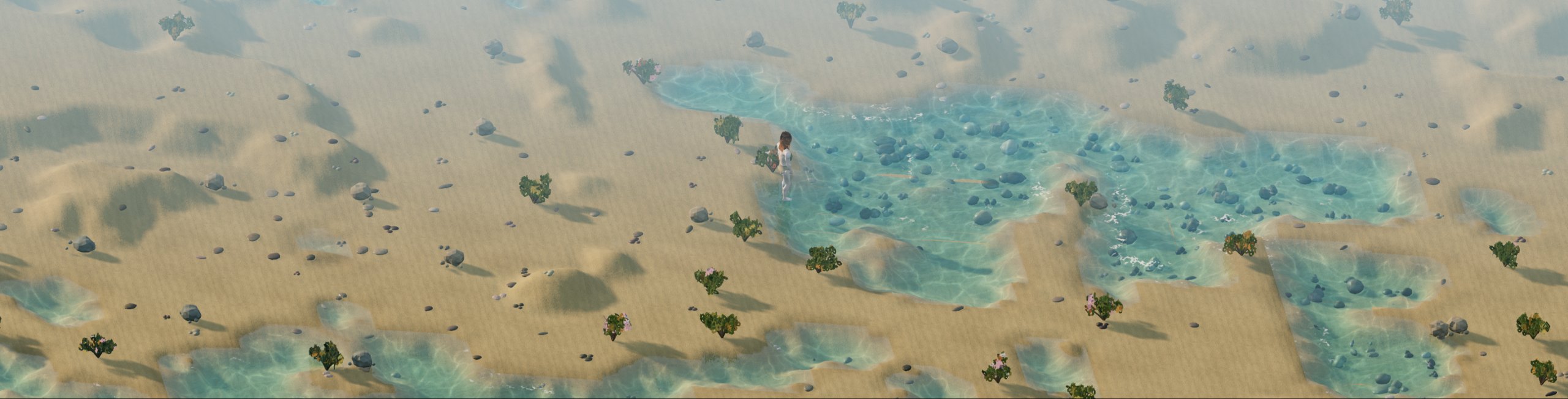 La costa di Fioralba nel pomeriggio, con una giocatrice nell'acqua bassa